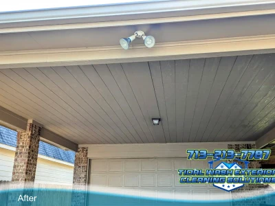 Exterior garage carport ceiling cleaning in League City by Tidal Wash, March 2025