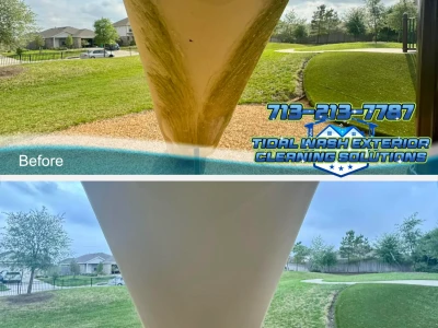 Long slide under a jungle gym receiving soft wash treatment in Rosharon HOA playground.