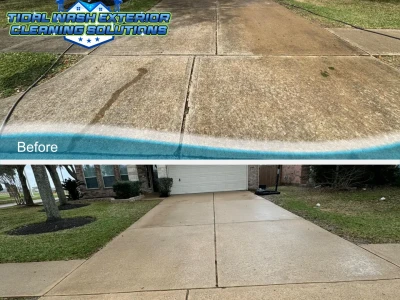 Cleaned residential driveway near the coast in Galveston after professional pressure washing.