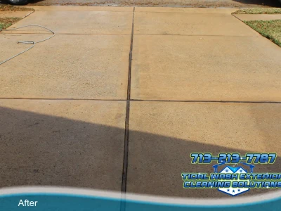 Tidal Wash Team Cleaning Driveway Surface