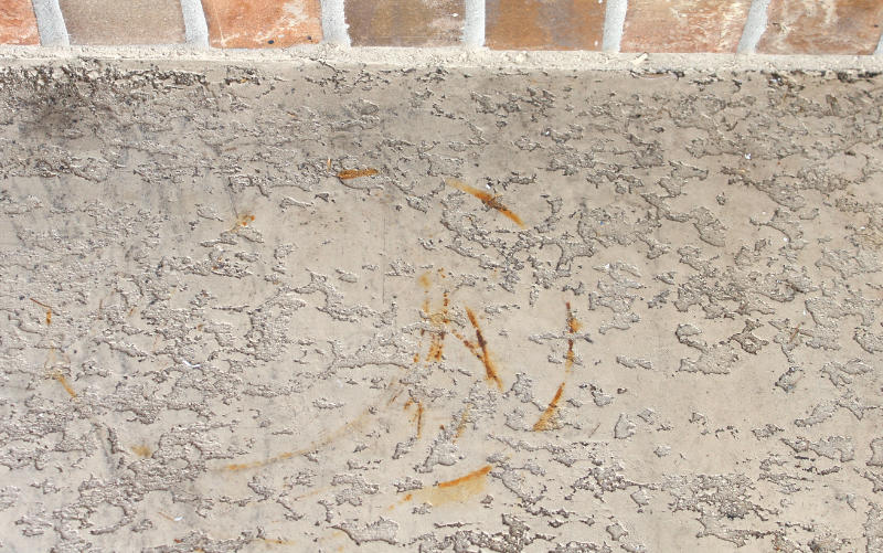 Rust on concrete coating surface